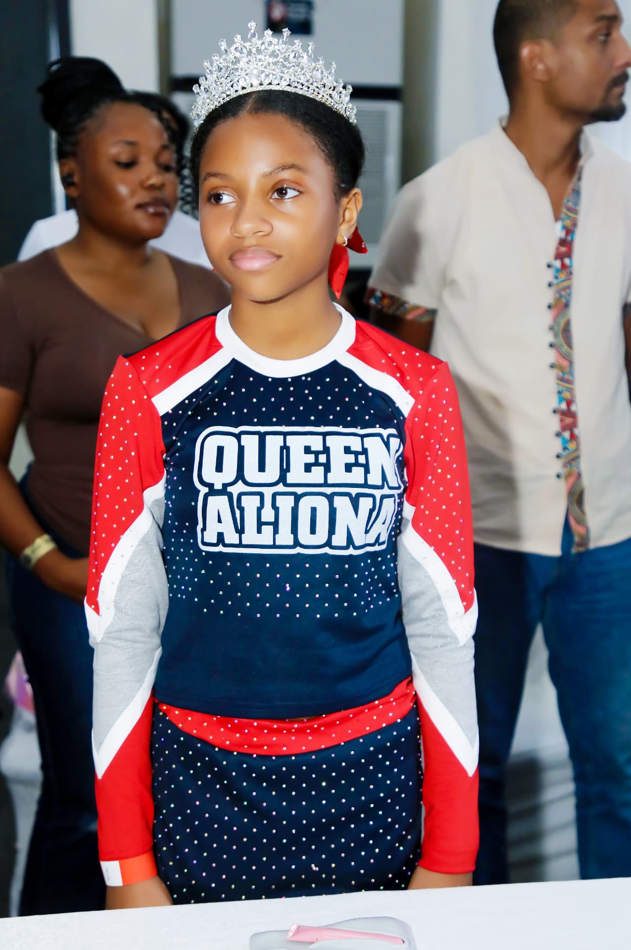 A cheerleader wearing a crown at BOC